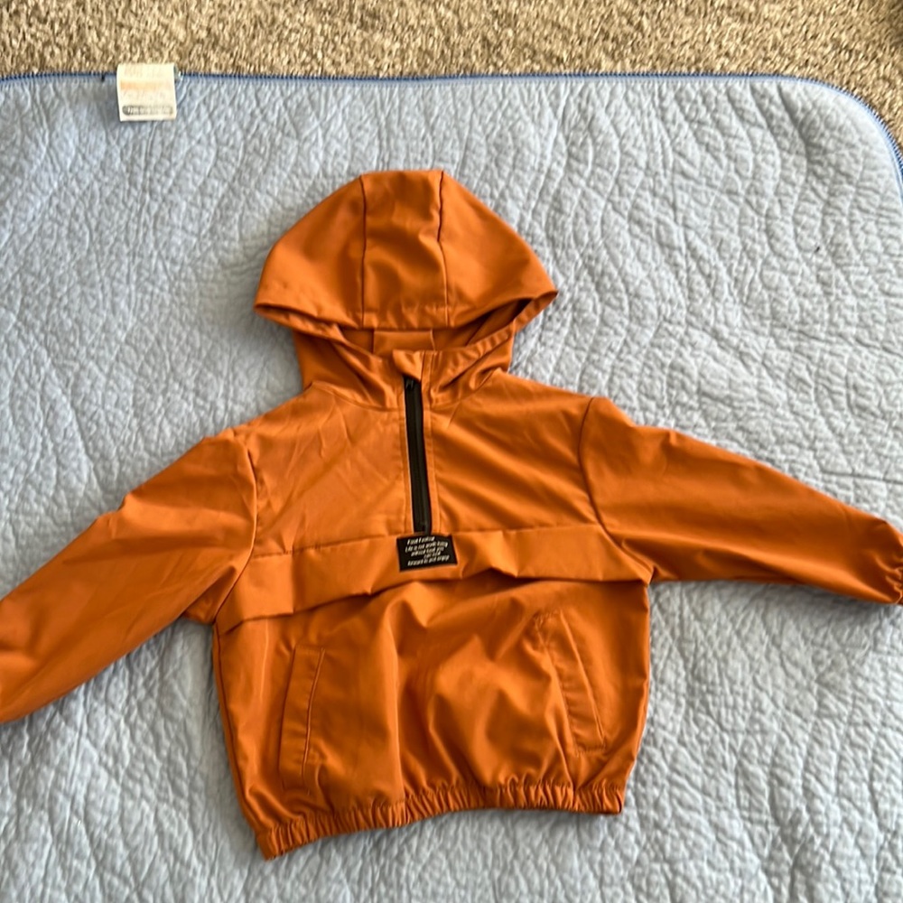 Burnt orange windbreaker